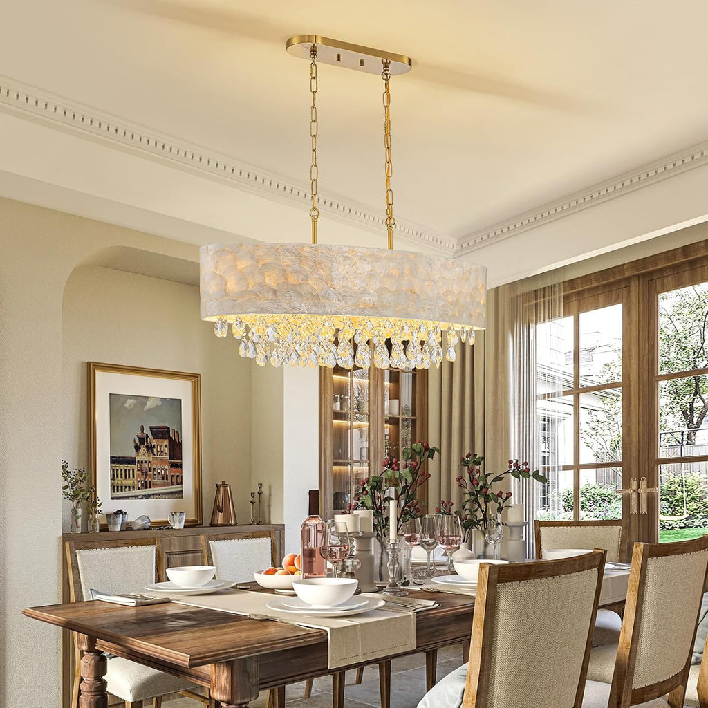 LumFurn 6-Light Oval Capiz Shell Crystal Linear Chandeliers, Coastal Design Light Fixture for Dining Room, Kitchen Island, L32xW12xH19~65in(Adjustable), K9 Crystal, Shell Lampshade & Brass Finish