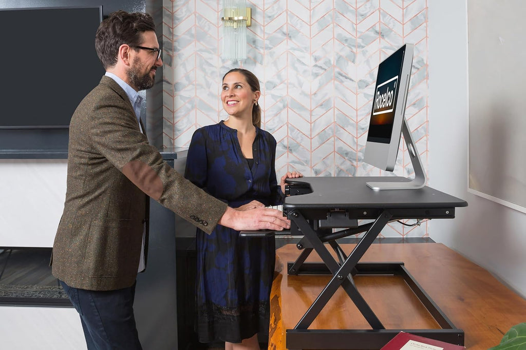 Rocelco 40' Height Adjustable Standing Desk Converter with AC Outlet USB Charger and Anti-Fatigue Floor Mat - Sit Stand Up Tabletop Riser - Sliding Keyboard Tray - Black (R DADRB-40-ACUSB-MAFM)