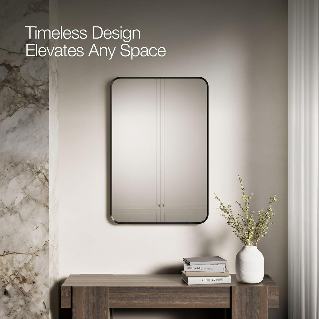 Kohler Essential 24 in. W x 36 in. H Rectangular Framed Wall Mount Bathroom Vanity Mirror in Matte Black